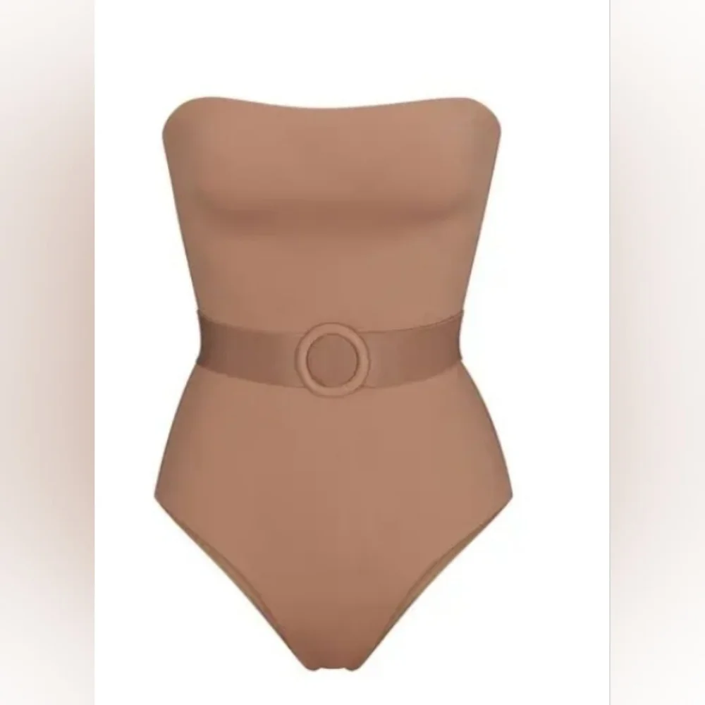 Skims sculpting one piece belted.
